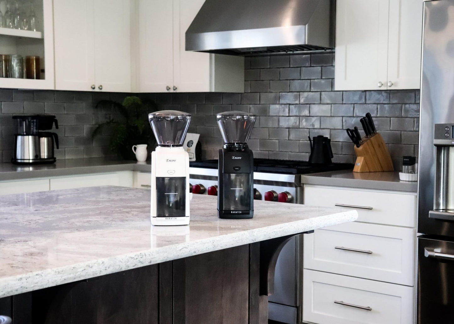2 Baratza Encore Coffee Grinders on a table